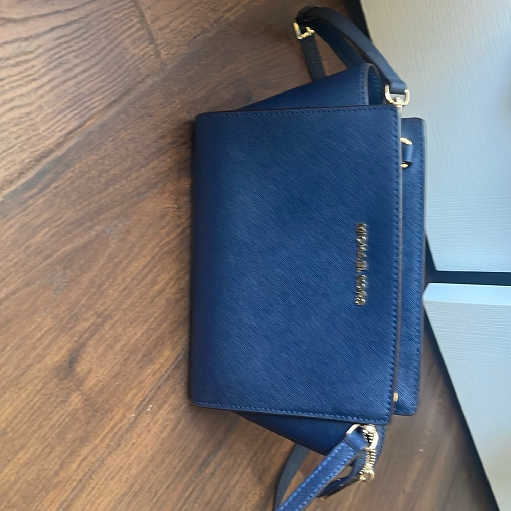 Michael Kors small cross body.